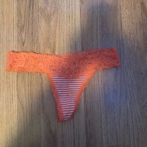 Orange strip thong